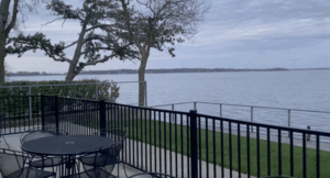 view of the lake from a hotel room patio